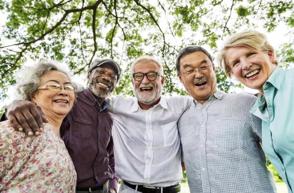 Group of older adults enjoying their time together in a senior living community